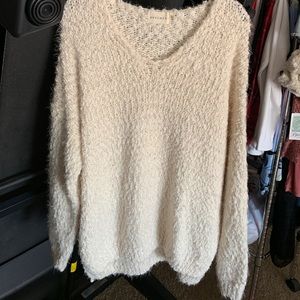 Dreamer sweater size M/L, fits loosely